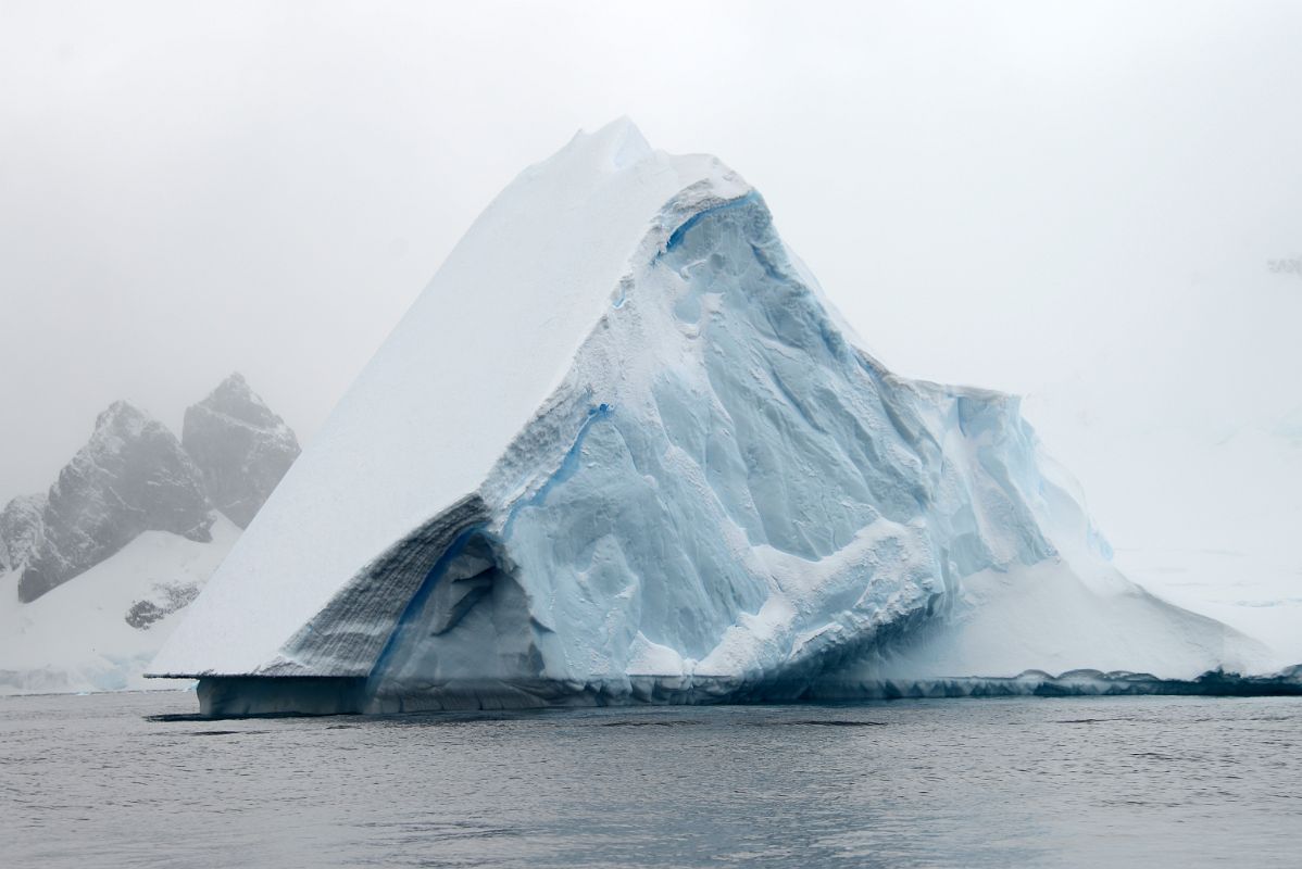 03D Large Iceberg With Blue Racing Stripe From Zodiac Near Danco Island On Quark Expeditions Antarctica Cruise